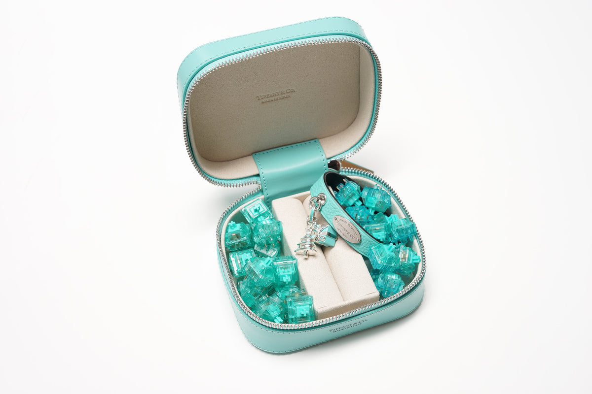 Tiffany blue ring box featuring Tiffany blue bracelet and charms with Tealios